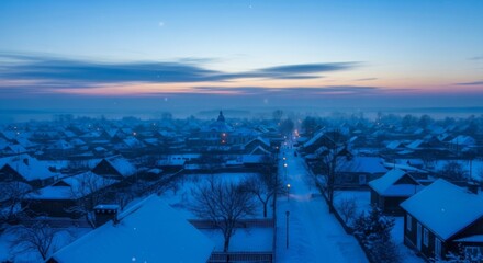 A serene winter cityscape at dawn, with snow-covered rooftops and quiet streets. The soft, pastel-colored sky contrasts beautifully with the sparkling snow, creating a peaceful morning atmosphere.