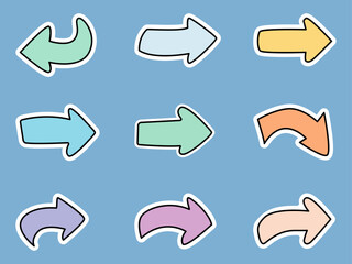 Colorful arrow stickers on a blue background for creative designs.