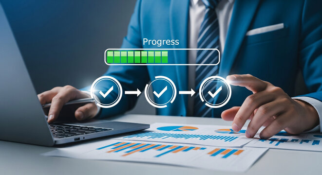 Man Analyzing Network Connection Diagram on Desk