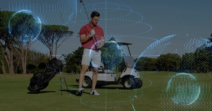 Standing golfer in red polo balancing club on shoulder beside bag on fairway, with digital globe