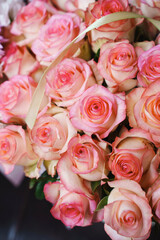 Beautiful arrangement of fresh pink roses in a bouquet