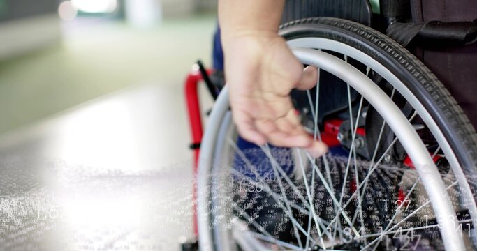 Guiding woman pushing wheelchair with right hand in hall, red frame denim pants overlay, copy space