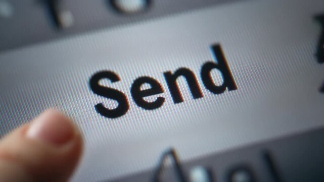 Close-up of a finger poised to press the send button on a digital screen.