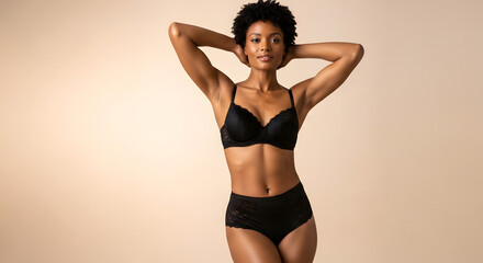 Confident person posing with hands raised overhead in minimal studio setup — fitness-inspired lifestyle portrait showcasing strength, body positivity, and self-confidence