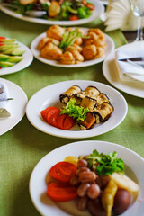 Delicious dishes served on a festive dining table