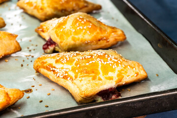 Puff pastry triangles with jam. Baking. Food concept.