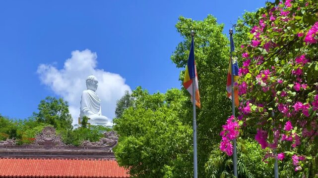 Nha Trang, Vietnam - September 18, 2025. Chua Long Son Pagoda with a large white Buddha statue in the vast, clear blue sky. The main Buddhist temple of Kien Giang Province. 4К