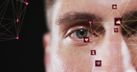 Male face, nodes and icons appearing near eye lines linking icons showing technology connectivity - Powered by Adobe
