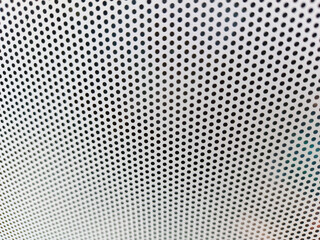 Close-up view at One Way Vision sticker film with dot pattern on glass. White concept design