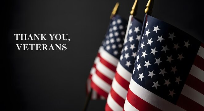 veterans day, Three US flags waving with a thank you veterans phrase. A patriotic display of gratitude and respect for veterans. The American flag waves proudly against a dark background.