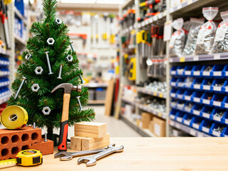 Christmas tree decorated with construction tools in a hardware store