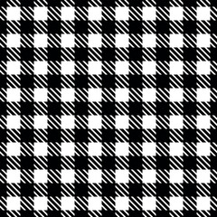 Seamless black and white checkered pattern with diagonal line texture textile background