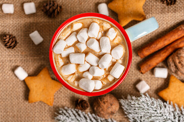 Mug with cocoa and marshmallows, cozy Christmas drink in a festive setting on an isolated background, top view