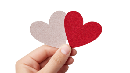 Hand Holding Red and White Heart Cutouts on White Background