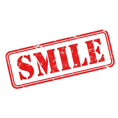Red distressed rubber stamp with the word smile in bold uppercase letters isolated on transparent background