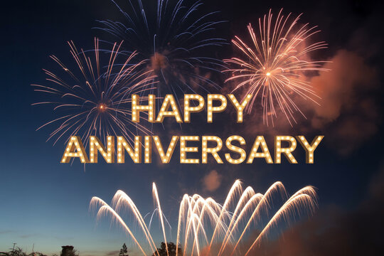 Celebrate a milestone with stunning fireworks and shimmering marquee lights spelling Happy Anniversary for heartfelt greetings and festive occasions