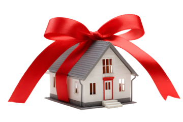 Small white house with a large red ribbon tied around it like a gift isolated on transparent background