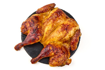 Roasted Chicken on Slate, isolated on white background