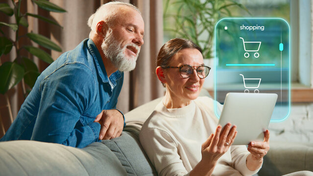 Senior couple online shopping using futuristic digital interface at home. Concept of e-commerce, financial awareness, smart lifestyle, family connection, and modern digital comfort. Creative collage - Powered by Adobe
