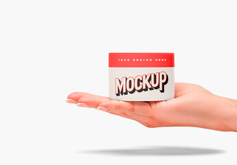 Jar Cosmetic In Hand Mockup (1)