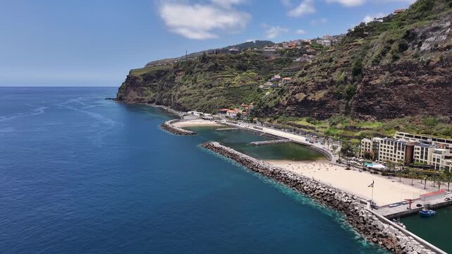 Artificial beaches at Calheta seaside resort protected by breakwaters, aerial