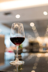 Glass of red wine on the table in restaurant