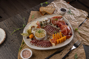Charcuterie board featuring assorted cheeses