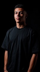 Real Professional photo studio of a young Latin Guy 21 years old, Wearing a Black T-Shirt, White solid Background,