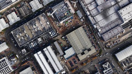 Data centers in Slough, England. Data facilities under construction. - Powered by Adobe