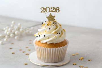 Festive cupcake with gold glitter 2026 topper, white frosting, black and gold sprinkles, star confetti, pearls, and elegant celebration theme generative ai