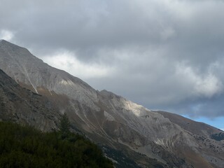 Alpine ridge and dramatic clouds over the mountains