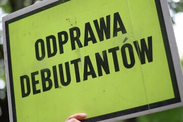 Hand-held Polish Sign for Debutants' Briefing on parkrun event