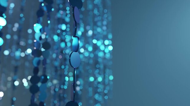 Sparkling blue sequins curtain shimmering at night