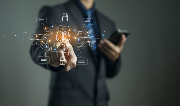 Businessman using artificial intelligence technology and data security system for digital innovation, cybersecurity, and smart business solutions in the modern virtual world.