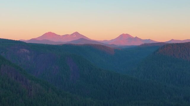 Aerial drone footage of Oregon&rsquo;s Cascade Mountains and Three Sisters at sunset