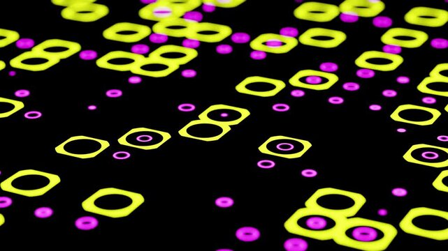 Yellow and purple abstract shapes floating on a black background