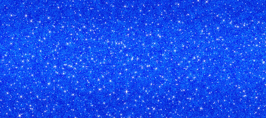 Blue glitter sparkle background. Texture appears festive, shiny, and luxurious. perfect for use in designs related to celebrations, parties, glamour, or holiday themes. 