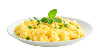 Fluffy scrambled eggs with basil garnish isolated on a transparent background