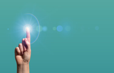 Finger touching digital interface. Hand gesture with blue light flare and hologram effect, symbol of