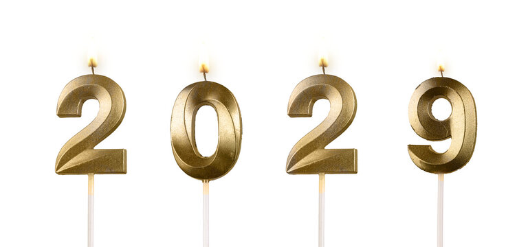 Glossy number candles 2029 illuminated with warm flame, symbol of festive celebration, joy, and New