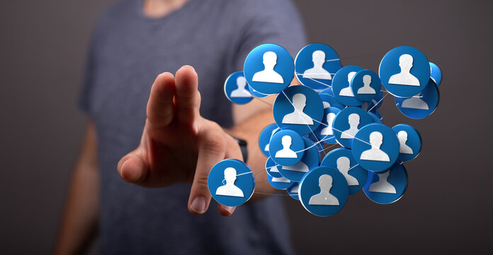 Hand reaching towards a network of connected people icons. Represents teamwork, communication, and social media connections. Ideal for business - Powered by Adobe