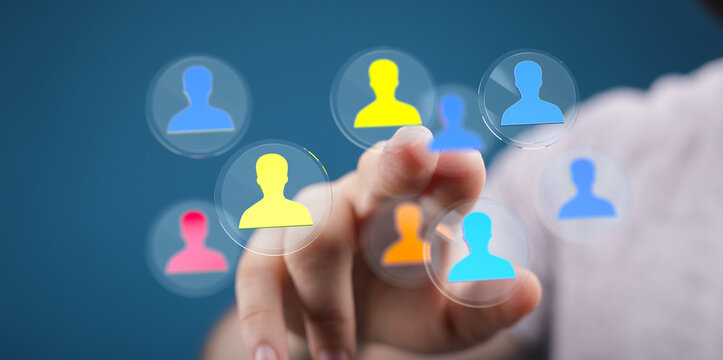 Hand pointing at colorful digital people icons. Represents teamwork, communication, and networking with a virtual connection. - Powered by Adobe