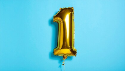 Gold Number One Balloon on Blue Background Symbolizing Celebration and Editorial Styling for Milestone Events