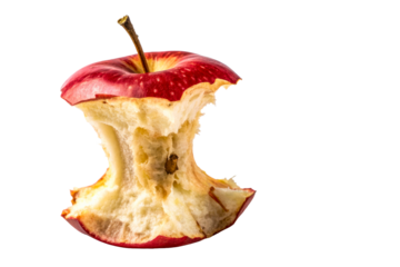 Bitten red apple core with stem on white surface