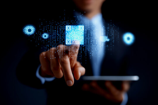 A person interacts with a digital interface, highlighting a QR code against a dark background, symbolizing technology and connectivity.