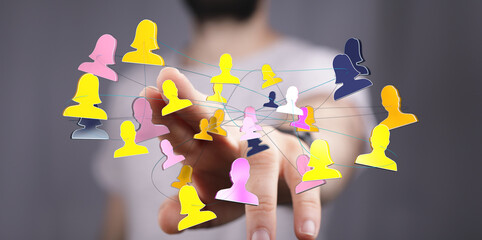 Concept of social network and global connections visualized. Human hand interacting with digital interface showing interconnected people. Teamwo