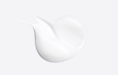 cosmetic care product smear of cream texture on a light background