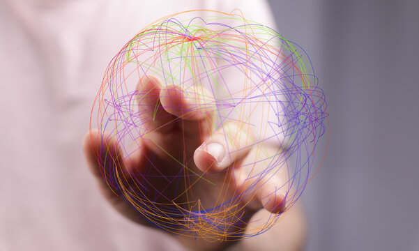 Abstract image of a person touching a digital network sphere, representing global connection, technology, and communication concepts.