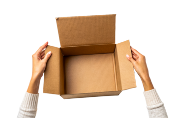 Hands opening empty cardboard box on white table