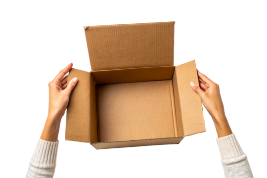 Hands opening empty cardboard box on white table